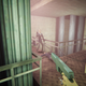 A screenshot from Agent 64 that shows a single enemy in a suit standing in front of the player.